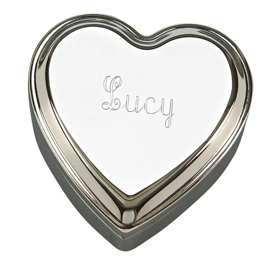A Creative Gifts HEART JEWELRY BOX, featuring a silver heart-shaped design with the name Lucy engraved in cursive on the lid.
