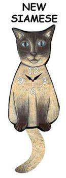 The Pink Cloud Siamese Cat - New - Wagging Tail Cat Clock features blue eyes, a clock face on its body, and a swinging tail. Perfect as an animal wall clock or playful cat decor for any room!.