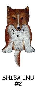 Pink Cloud’s Shiba Inu #2 - Wagging Tail Dog Clock features a Shiba Inu with a wagging tail, a clock face on its chest showing 9, 6, and 3, and the text "SHIBA INU #2" below the illustration.