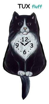 The Pink Cloud Cat - Tux Fluff - Wagging Tail Cat Clock is a black and white tuxedo cat-shaped clock with "TUX fluff" above the clock face on its chest—perfect decor for any room.