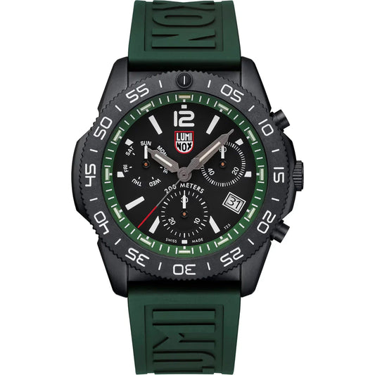 The Luminox Pacific Diver Chronograph XS.3147 is a Swiss-made black and green diver watch with a green rubber strap, black bezel, three chronograph subdials, date window, white hour markers, and 200m water resistance.